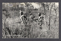 BOLIVIA - 1933 - CHACO WAR: Real photographic black & white PPC of Group of Soldiers on patrol in brushland inscribed 'GUERRA DEL CHACO Patrulla' on picture side and 'Editor y Fotografo LUIS BAZOBERRI G. Casilla 11 Cochabamba (Bolivia) Prohibida la reproduccion' on message side. An unused example with some staining and a small repaired scuff on picture side.  (BOL/38931)
