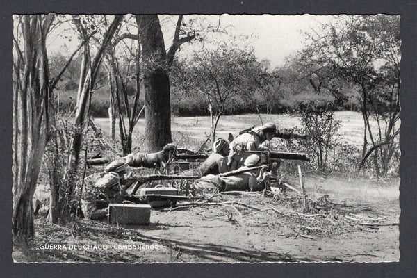 BOLIVIA - 1933 - CHACO WAR: Real photographic black & white PPC of soldiers in hide in the forest inscribed 'GUERRA DEL CHACO Combatiendo' on picture side and 'Editor y Fotografo LUIS BAZOBERRI G. Casilla 11 Cochabamba (Bolivia) Prohibida la reproduccion' on message side. Fine unused & very scarce.  (BOL/38934)