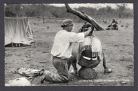 BOLIVIA - 1933 - CHACO WAR: Real photographic black & white PPC of Soldier getting a haircut inscribed 'GUERRA DEL CHACO Peluquero en campana' on picture side and 'Editor y Fotografo LUIS BAZOBERRI G. Casilla 11 Cochabamba (Bolivia) Prohibida la reproduccion' on message side. Fine unused & very scarce.  (BOL/38939)