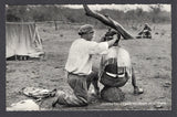 BOLIVIA - 1933 - CHACO WAR: Real photographic black & white PPC of Soldier getting a haircut inscribed 'GUERRA DEL CHACO Peluquero en campana' on picture side and 'Editor y Fotografo LUIS BAZOBERRI G. Casilla 11 Cochabamba (Bolivia) Prohibida la reproduccion' on message side. Fine unused & very scarce.  (BOL/38939)