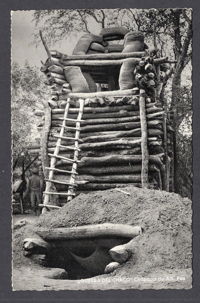 BOLIVIA - 1933 - CHACO WAR: Real photographic black & white PPC of bunker and elevated gun position inscribed 'GUERRA DEL CHACO Chapapa de Am. Pes.' on picture side and 'Editor y Fotografo LUIS BAZOBERRI G. Casilla 11 Cochabamba (Bolivia) Prohibida la reproduccion' on message side. Fine unused & very scarce.  (BOL/38942)