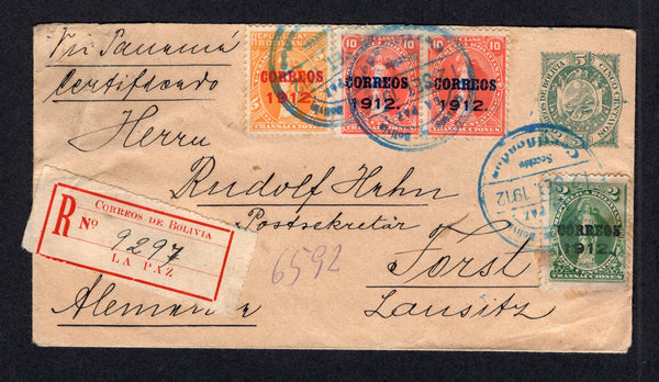 BOLIVIA - 1912 - POSTAL STATIONERY & PROVISIONAL ISSUE: 5c green on buff postal stationery card (H&G B5) used with added 1912 2c green, 5c orange and pair 10c vermilion Revenue issue with 'CORREOS 1912' overprints (SG 130/132) tied by LA PAZ CERTIFICADOS cds's in blue dated 2 SEP 1912 with printed red on white 'LA PAZ' registration label alongside. Addressed to GERMANY with arrival cds on reverse. Backflap missing but a very scarce franking featuring the full set of Provisionals.  (BOL/38952)
