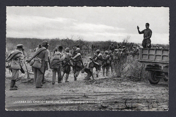 BOLIVIA - 1933 - CHACO WAR: Real photographic black & white PPC of soldiers being blessed by chaplain as they go out to battle inscribed 'GUERRA DEL CHACO Benedicion antes del ataque (Anochecer)' on picture side and 'Editor y Fotografo LUIS BAZOBERRI G. Casilla 11 Cochabamba (Bolivia) Prohibida la reproduccion' on message side. Fine unused & very scarce.  (BOL/39499)