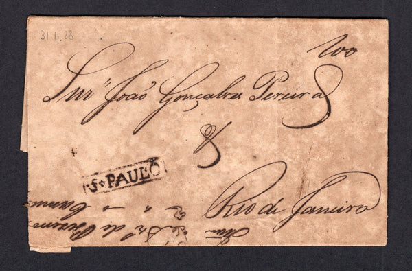 BRAZIL - 1828 - PRESTAMP MAIL: Folded letter from SAO PAULO to RIO DE JANEIRO with fine strike of small boxed 'S.PAULO' marking in black. Rated 100rs in manuscript. Cover has the usual overall toning. Scarce.  (BRA/20606)