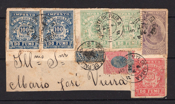 BRAZIL - 1894 - POSTAL FISCAL: Large piece with 10rs blue & rose 'Sugarloaf' and BISECTED 500rs black & blue 'Liberty Head' issue plus 1892 pair 20rs green, pair 100rs blue and single 200rs rose plus 1894 10rs lilac  'Imposto do Funo' REVENUE issues all tied by multiple strikes of VICENTE DE PAULA cds's dated 4 JAN 1894. Some of the stamps have faults but a very unusual and rare item. (SG 115 & 130, Forbin #1/2, 29 & unlisted)  (BRA/26186)