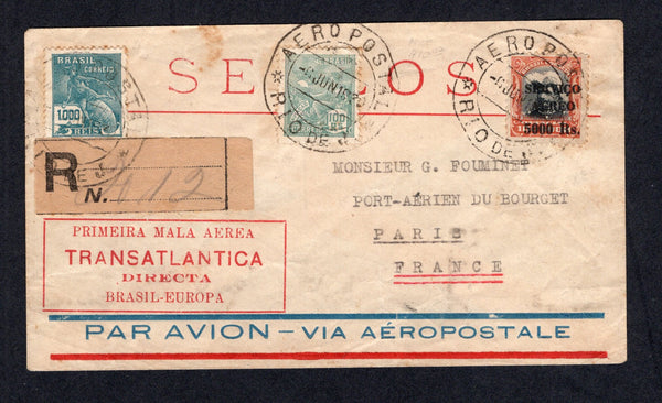 BRAZIL - 1930 - FIRST FLIGHT: Registered Aeropostale airmail cover franked with 1920 100rs turquoise green and 1000rs turquoise blue 'Industry' issue plus 1927 5000rs on 100000rs black & vermilion 'SERVICIO AEREO' overprint issue (SG 382, 386 & 454) tied by large AEROPOSTAL RIO DE J cds's dated 11 JUN 1930 with plain registration label and boxed 'PRIMEIRA MALA AEREA TRANSATLANTICA DIRECTA BRASIL - EUROPA' cachet in red all on front. Flown on the 'Mermoz' non stop transatlantic crossing from RIO DE JANEIRO 