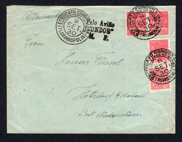 BRAZIL - 1930 - PRIVATE AIRMAIL COMPANIES - CONDOR: Commercial cover franked  with 1920 200rs rose red and 300rs rose red 'Industry' issue plus pair 1927 1000rs carmine CONDOR issue (SG 330 & 333 and Sanabria #C3) tied by SYNDICATO CONDOR BLUMENAU cds's with FLORIANOPOLIS 'Condor' transit cds and 'PELO AVIAO CONDOR M.P.' cachet in black on front. Addressed to GERMANY with RIO DE JANEIRO transit cds and boxed 'UTILIZE SE DO SERVICIO AEREO CONDOR' cachet in blue on reverse.  (BRA/29191)