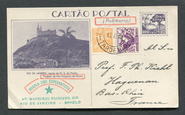 BRAZIL - 1934 - POSTAL STATIONERY: 100r dull violet on grey white 'Exposition' postal stationery view card (H&G 43) with view: 'Rio de Janeiro: Igreja de N.S. da Penha' used with added 1920 100rs orange 'Industry' definitive and 1933 200rs violet (SG 392 & 541) tied by light LARGO DA LAPA TARDE RIO cds dated 13.II. 1934. Addressed to FRANCE. Commercially used from a member of the Brazilian Esperanto League. A rare card in used condition.  (BRA/29989)