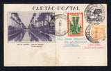 BRAZIL - 1938 - POSTAL STATIONERY: 100r dull violet on grey white 'Exposition' postal stationery view card (H&G 43) with view: 'Rio de Janeiro: Canal do Mangue' used with added 1920 100rs yellow orange 'Industry' issue and 1937 300rs green & red orange (SG 404 & 603) tied by CORUMBA cds's dated 7 ABR 1938. Addressed to SWITZERLAND with full commercial message on reverse. Light stain on front.  (BRA/38007)