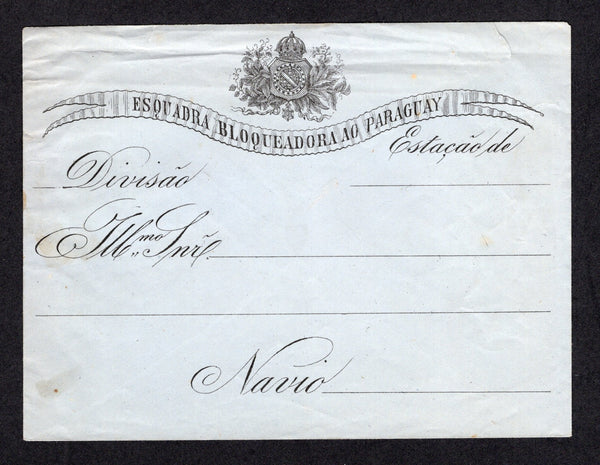BRAZIL - 1865 - WAR OF THE TRIPLE ALLIANCE: Printed black on blue 'Campaign against Paraguay' soldier's envelope with 'Arms' at top and inscribed 'Esquadra Bloqueadora ao Paraguay, Divisao. Estacao de. Navio.' for use by the Navy during the blockade of Paraguay. A fine unused example. Two small tears at top but very rare. (RHM #ENGP-2)  (BRA/40345)