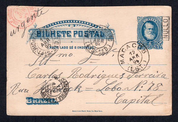 BRAZIL - 1895 - INSTRUCTIONAL MARK: 40rs blue 'Dom Pedro' postal stationery card (H&G 12) used with MACACOS (EST) cds dated 12 ABR 1895. The card was disallowed for postage as it depicted the deposed Emperor with small boxed 'NULLO' along the side of the portrait at top right. Addressed to RIO DE JANEIRO with CACHOEIRA AMBULANTE travelling P.O. cds on front with various other transit & arrival marks. Unusual.  (BRA/40380)