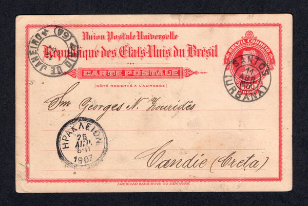 BRAZIL - 1907 - DESTINATION: 100rs red postal stationery card (H&G 33a) used with SANTOS (URBANA) cds dated 11 ABR 1907. Addressed to CANDIE, CRETA (Crete, Greece) with RIO DE JANEIRO transit cds on front with HERAKLION transit cds alongside. Card has a few small scuffs on face.  (BRA/40630)