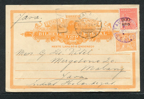 BRAZIL - 1934 - DESTINATION: 100rs orange postal stationery card (H&G 42) used with added 1920-1940 100rs orange & 200rs on 500rs rose 'Industry' definitives tied by TAQUARY (R.G.DO SUL) cds in purple. Addressed to JAVA, DUTCH EAST INDIES with MALANG arrival cds on front.  (BRA/9955)