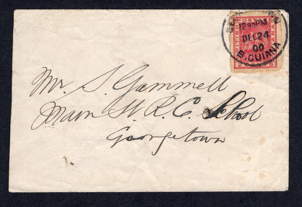 BRITISH GUIANA - 1900 - STAMP SHORTAGE & POSTAL STATIONERY CUT OUT: Cover franked with a 1884 2c carmine on cream 'Ship' postal stationery wrapper CUT OUT (H&G E2) tied by GEORGETOWN cds dated DEC 24 1900. Addressed locally within GEORGETOWN. A scarce provisional use due to the stamp shortage.  (BRG/39254)
