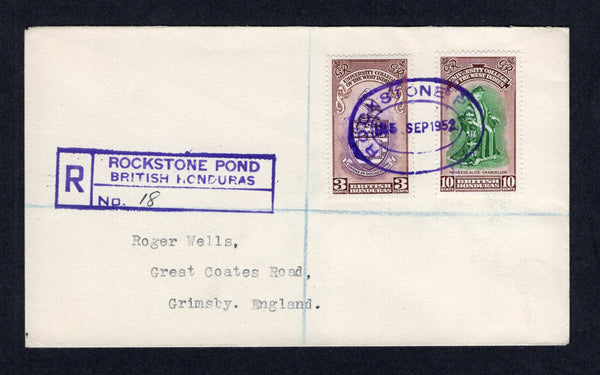 BRITISH HONDURAS - 1952 - CANCELLATION & REGISTRATION: Registered 'Wells' cover franked with 1951 'BWI University' pair (SG 176/177) tied by superb strike of oval ROCKSTONE POND temporary datestamp in bright purple dated 25 SEP 1952 with fine strike of boxed 'ROCKSTONE POND BRITISH HONDURAS NO. 18' registration marking alongside also in bright purple with number inserted in manuscript. Addressed to UK with BELIZE REGISTRATION transit mark on reverse.  (BRH/33502)