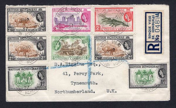 BRITISH HONDURAS - 1957 - CANCELLATION & REGISTRATION: Registered cover franked with 1953 2 x 1c green & black, 3 x 2c yellow brown & black, 3c reddish violet & bright purple, 4c brown & green and 5c deep olive green & scarlet QE2 issue (SG 179/183) tied by multiple fine strikes of BENQUE VIEJO cds dated 19 NOV 1957 with printed blue & white 'BENQUE VIEJO BR. HONDURAS' registration label alongside. Addressed to UK with BELIZE transit cds on reverse.  (BRH/36462)