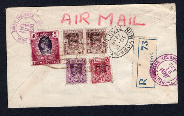 BURMA - 1947 - INTERIM GOVERNMENT ISSUE & REGISTRATION: Registered cover franked on reverse with 1947 pair 3p brown, 2a claret, 4a purple and 1r violet & maroon GVI 'Interim Government' overprint issue (SG 68, 73, 77 & 79) tied by RANGOON G.P.O. cds with printed blue & white RANGOON registration label alongside. Sent airmail to USA with arrival marks on reverse.  (BUR/18216)