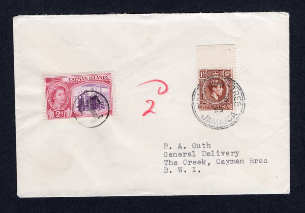 CAYMAN ISLANDS - 1955 - POSTAGE DUE: Incoming cover from Jamaica franked with 1938 1½d brown GVI issue (SG 123) tied by HALF-WAY TREE cds dated SEP 5 1955. Addressed to 'The Creek, Cayman Brac' taxed with manuscript '2d' in red crayon and added 1953 2d reddish violet & cerise QE2 issue (SG 152) used as a postage due and tied by small 'T' in circle cancel.  (CAY/40154)