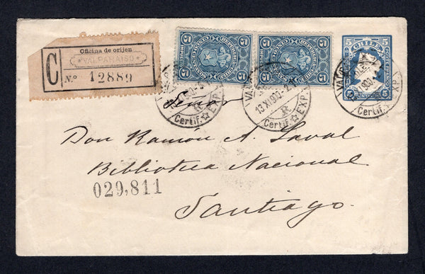 CHILE - 1900 - POSTAL STATIONERY, POSTAL FISCAL & REGISTRATION: 5c blue postal stationery envelope (H&G B14) used with added 2 x 1900 5c blue 'Postal Fiscal' issue (SG F88, authorised for postal use during the temporary shortage between October 1900 and January 1901, the fourth period of use) tied by VALPARAISO cds's dated 13 NOV 1900 with printed 'C OFICINA DE ORIJEN VALPARAISO' registration label alongside. Addressed to SANTIAGO with arrival cds on reverse.  (CHI/32208)