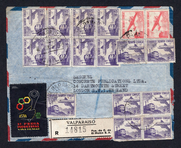 CHILE - 1957 - PRIVATE REGISTRATION & CINDERELLA: Registered airmail cover with 'FAB. DE CEMENTO DE "EL MELON" S.A.' imprint on flap franked with 1956 block of eight, block of four, pair and single 5p violet and pair 50p rose red AIR issue (SG 455 & 454) with 'ASIVA 1a Feria Industrial Vina del Mar' illustrated 'Hand with Wrench' cinderella label all tied by VALPARAISO ds's dated 2 JUN 1957 with black & white printed 'VALPARAISO R 14815 Fca. de C. de El Melon S.A.' registration label alongside. Addressed t