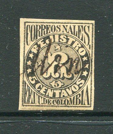 COLOMBIA - 1870 - REGISTRATION ISSUE: 5c black 'R' registration issue first printing with vertical lines in centre. A superb four margin copy used with part manuscript cancel in black. (SG R74)  (COL/29404)