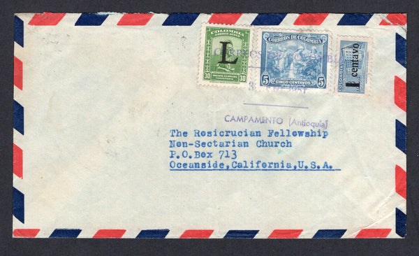 COLOMBIAN AIRMAILS - LANSA - 1952 - CANCELLATION: Airmail cover franked with 1939 5c light blue, 1951 1c on 3c blue TAX issue and 1950 30c green LANSA 'Air' issue with large 'L' overprint (SG 536, 740 & 14) all tied by unframed three line 'CORREOS DE COLOMBIA 3 JAN 1951 CAMPAMENTO (ANTIOQUIA)' in purple with date error (1951 for 1952). Addressed to USA with MEDELLIN transit marks on reverse.  (COL/31589)