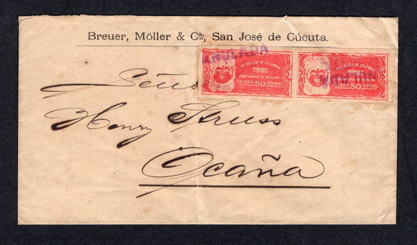 COLOMBIAN STATES - SANTANDER - 1903 - POSTAL FISCAL & CANCELLATION: Circa 1903. Undated cover with printed 'Breuer, Moller & Ca, San Jose de Cucuta' return address at top franked with pair 1903 50c red 'Postal Fiscal' (SG F20) tied by two strikes of two line 'ANULADA CUCUTA' cancel in purple. Addressed to OCANA. Very scarce.  (COL/35205)