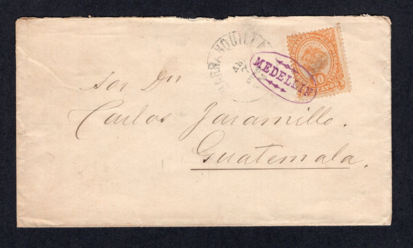 COLOMBIA - 1886 - DESTINATION: Cover franked with single 1883 10c orange on yellow (SG 111) tied by small undated oval MEDELLIN cancel with ornaments in purple. Addressed to GUATEMALA with BARRANQUILLA transit cds on front dated ABR 7 1886. Very attractive.  (COL/40581)