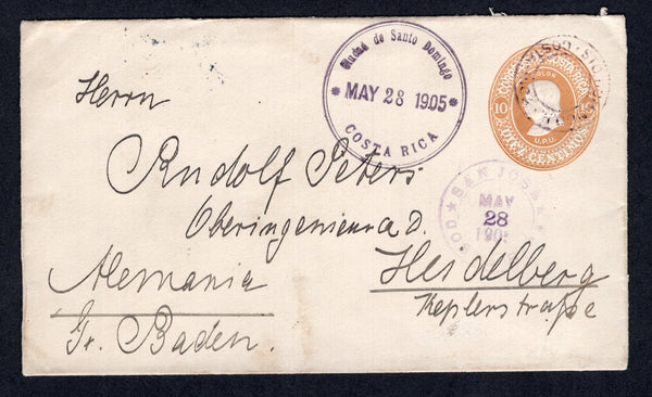 COSTA RICA - 1905 - POSTAL STATIONERY & CANCELLATION: 10c brown ochre on white postal stationery envelope (H&G B6a) used with undated circular SANTO DOMINGO H. cds with fine strike of large CIUDAD DE SANTO DOMINGO COSTA RICA cds dated MAY 28 1905 alongside. Addressed to GERMANY with SAN JOSE transit cds on front and German arrival cds on reverse.  (COS/35424)