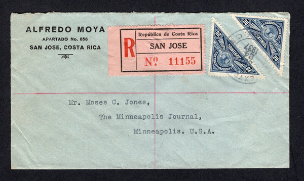 COSTA RICA - 1937 - TRIANGLE ISSUE & REGISTRATION: Registered cover franked with 2 x 1932 20c blue 'National Philatelic Exhibition' TRIANGULAR issue (SG 197) tied by SAN JOSE cds dated SET 24 1937 with large printed black & red on salmon registration label alongside. Addressed to USA with transit and arrival marks and money declaration cachet on reverse.  (COS/40045)