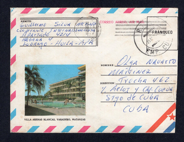 CUBA - 1986 - POSTAL STATIONERY & CUBAN MILITARY FORCES IN ANGOLA: Undenominated 'FRANQUEO' postal stationery envelope with view of 'Villa Arenas Blancas, Varadero, Matanzas' sent by a member of the Cuban voluntary force in Luanda, Angola with manuscript 'Guillermo Silva Merino, Cooperante Internasionalista, APARTADO 4214, Habana 4, Lubango - Huila - RPA' return address at top left used with fair strike of large 'R.P.A. EMP CUBAT' cds and CUBA CLASIF NACIONAL machine cancel applied on arrival. Addressed to