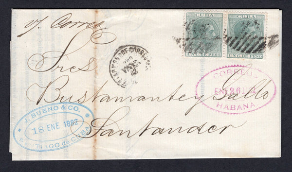 CUBA - 1882 - RATE: Complete printed folded circular datelined 'Santiago de Cuba 2 de Enero de 1882' franked with pair 1882 1c green (SG 97) tied by barred oval cancels with partial ADMON DE CORREOS SANTIAGO cds in black alongside with oval 'J. BUENO & CO. SANTIAGO DE CUBA' company handstamp in blue and oval CORREOS HABANA transit mark in purple dated JAN 26 1882 on front. Addressed to SPAIN with arrival cds on reverse.  (CUB/36501)
