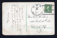 DANISH WEST INDIES - 1924 - US NAVY: Colour PPC 'Coaling Girls, St. Thomas, V.I., U.S.A.' franked on message side with USA 1918 1c grey green (SG 530) tied by fine strike of 'U.S.S. SAVANNAH' U.S. Naval cds dated FEB 21 1924. Addressed to USA. Message mentions arriving in St Thomas.  (DEN/37149)