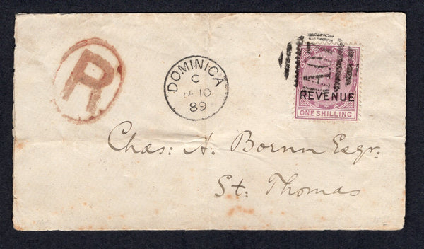 DOMINICA - 1889 - POSTAL FISCAL & REGISTRATION: Registered cover franked with single 1879 1/- magenta QV issue 'Postal Fiscal' issue with 'REVENUE' overprint (SG R3) tied by fine barred numeral 'A07' cancel with DOMINICA cds dated JAN 10 1889 alongside and 'R' in oval registration marking in red. Addressed to a business in ST THOMAS with arrival cds on reverse. A fine & rare inter-island registered cover and unusual use of the postal fiscal issue. Ex Sugarman.  (DMN/35617)