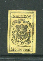 DOMINICAN REPUBLIC - 1870 - CLASSIC ISSUES: 'Medio real' black on yellow wove paper, a very fine unused copy, four large margins. Slight corner thin. (SG 19)  (DOM/2128)