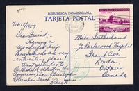 DOMINICAN REPUBLIC - 1957 - POSTAL STATIONERY: 9c violet & pink postal stationery airmail viewcard (H&G F1) with view 'First Cathedral of America' used with CIUDAD TRUJILLO DISTRITO NACIONAL roller cancel with additional CUIDAD TRUJILLO cds in green alongside. Addressed to CANADA.  (DOM/8682)