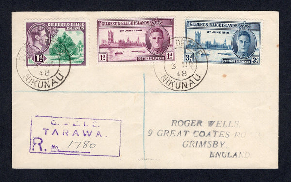 GILBERT & ELLICE ISLANDS - 1948 - CANCELLATION: Registered 'Wells' cover franked 1939 1d emerald & plum GVI issue & 1947 1d purple & 3d blue 'Victory' issue (SG 44 & 55/6) all tied by two strikes of POST OFFICE NIKUNAU cds. Registered in transit in TARAWA with boxed registration marking in purple. Addressed to UK with SUVA FIJI transit mark on reverse.  (GIL/564)