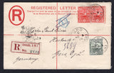 GRENADA - 1908 - POSTAL STATIONERY & REGISTRATION: 2d prussian blue on creamy EVII postal stationery registered envelope (H&G C3a) used with added 1906 ½d green and pair 1d carmine (SG 77/78) tied by G.P.O. GRENADA cds's dated NOV 2 1908 with printed red on white registration label alongside. Addressed to GERMANY with transit & arrival marks on reverse.  (GRE/35621)