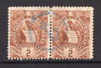 GUATEMALA - 1886 - CANCELLATION: 2c yellow brown 'Quetzal' issue, a fine used pair with central strike of large lower case 'T' IN CIRCLE postage due marking in blue. (SG 44)  (GUA/19224)
