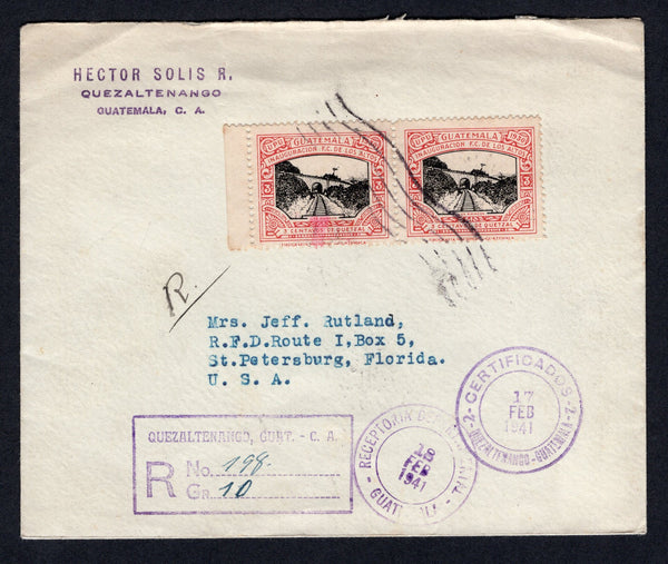 GUATEMALA - 1941 - RAILWAY ISSUE: Registered cover franked with pair 1930 3c black & carmine 'Opening of Los Altos Electric Railway' issue (SG 252) on front and block of four 1939 ½c red brown & green and 1938 1c olive green TAX issue on reverse (SG 368 & 400) all tied by 'Wavy Lines' cancels with CERTIFICADOS QUEZALTENANGO cds dated 17 FEB 1941 and boxed 'QUEZALTENANGO' registration marking in purple on front. Addressed to USA with transit & arrival marks on front & reverse.  (GUA/36483)