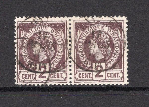 HAITI - 1882 - CLASSIC ISSUES: 2c purple on greyish PERFORATED 'Liberty Head' second issue a fine used pair with cds dated MARS 1887. (SG 22)  (HAI/5170)