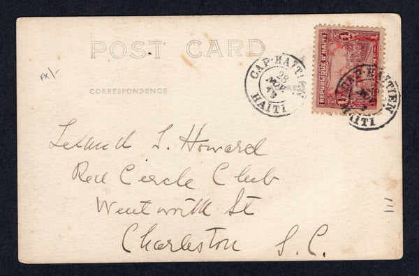 HAITI - 1919 - PROVISIONAL ISSUE: Sepia tone real photographic PPC 'Place Toussaint-Louverture Cap-Haitien, Haiti' franked on message side with single 1917 2c on 1p claret with boxed 'S D 2' overprint (SG 236) tied by CAP HAITIEN cds. Addressed to USA.  (HAI/9576)