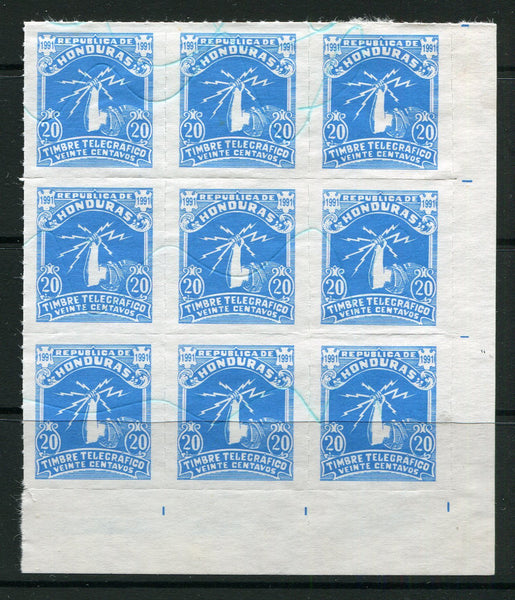 HONDURAS - 1991 - TELEGRAPH ISSUE: 20c bright blue 'Hand Holding Lightning Bolts' TELEGRAPH issue dated '1991', a corner marginal rouletted block of nine used with manuscript cancels. Unusual item. (Barefoot Unlisted)  (HON/11578)