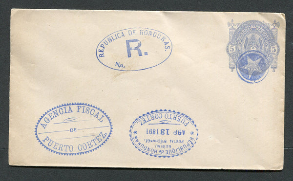 HONDURAS - 1890 - POSTAL STATIONERY: 5c blue on white 'Seebeck' postal stationery envelope (H&G B1) unused but with negative 'Star' cancel, oval 'REPUBLICA DE HONDURAS R' marking, oval 'AGENCIA FISCAL PUERTO CORTEZ' marking and smaller oval 'REPUBLIQUE DE HONDURAS BUREAU POSTAL D'EXCHANGE ABR 13 1891 PUERTO CORTEZ' marking all in blue. Likely from the official archive for recording the issue with the local Post Offices.  (HON/30250)
