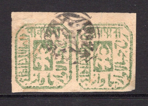 INDIAN STATES - JHALAWAR - 1886 - CLASSIC ISSUES: ¼a green 'Primitive' issue on LAID paper, a fine used top marginal pair with 'Native' seal type cancel in black. Small thin on reverse. (SG 2)  (IND/12799)