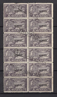 INDIAN STATES - TRAVANCORE - 1941 - CANCELLATION & MULTIPLE: 6ca blackish violet 'Maharaja's 29th Birthday' OFFICIAL issue with 'SERVICE' overprint, perf 11, a fine used block of twelve with four strikes of boxed 'TRIVANDRUM' cancel in black. Small perf fault on top left stamp. (SG O103a)  (IND/12890)