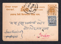 INDIAN STATES - INDORE - 1924 - POSTAL STATIONERY & COMBINATION MAIL: ¼a yellow brown on grey violet 'Holkar' postal stationery card (H&G 1) used with added India 1912 3p slate GV issue with 'SERVICE' overprint (SG O75) tied by PETALAWAD cds. Addressed to INDORE CITY with arrival cds on front.  (IND/20285)