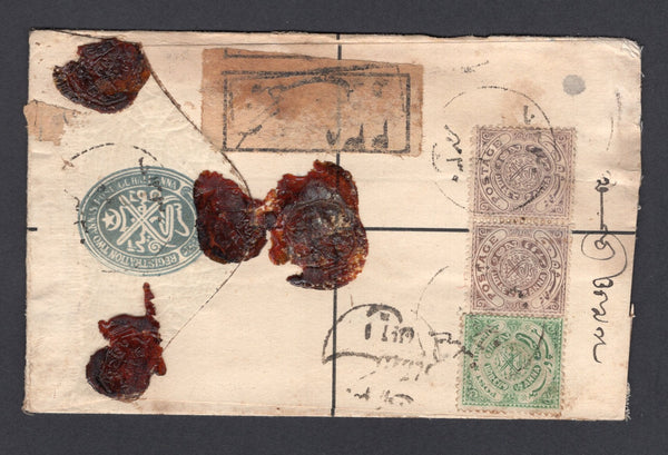 INDIAN STATES - HYDERABAD - 1915 - POSTAL STATIONERY & REGISTRATION: Circa 1915. 2a grey blue postal stationery registered envelope (H&G C2) used with added pair 1908 2a lilac and 1915 ½a green 'Post & Receipt' issue (SG 27 & 35) tied by 'Native' cds's with printed 'Native' registration label. Addressed locally with arrival marks.  (IND/20311)