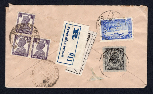 INDIAN STATES - HYDERABAD - 1945 - REGISTRATION & COMBINATION MAIL: Registered cover franked on reverse with 1931 4p black and 4a ultramarine plus India 1940 3 x 1½a dull violet  (SG 41, 45 & 269c) tied by 'Native' cds's and by 'English' HYDERABAD DECCAN cds's with printed 'Native' registration label with blue & white printed 'HYDERABAD DECCAN 91' registration label applied on top on reverse. Addressed to BOMBAY with arrival cds on reverse.  (IND/20325)