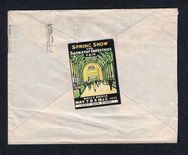 IRELAND - 1935 - CINDERELLA: Cover franked with 2 x 1922 1d carmine (SG 72) tied by DUBLIN 'BAILE ATHA CLAITH' machine cancel. Addressed to CANADA with lovely black, green & yellow 'SPRING SHOW AND SAORSTAT INDUSTRIES FAIOR BALL'S BRIDGE MAY 7,8,9,10 & 11 1935 VISIT OUR STAND' cinderella label on reverse.  (IRE/20719)